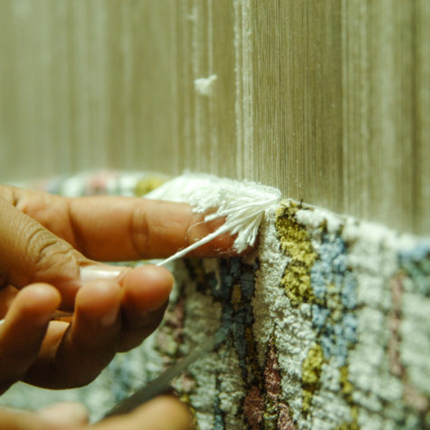 weaving and manufacturing of handmade carpets closeup